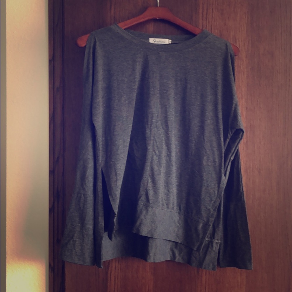 Long sleeve shirt with shoulder cutouts